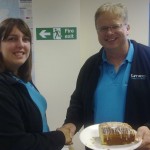 Faye Hemingway is congratulated by Trefor Davies for winning the Timico Lemon Drizzle Cake Competition