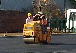 site manager Nigel has a word with the driver of the roller