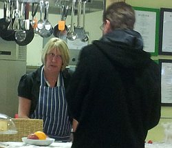 Simon Brown is served by Denise at the Beacon Centre in Newark