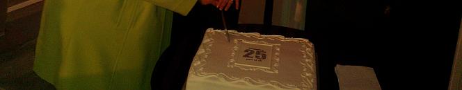 Baroness Rennie Fritchie and Nominet CEO Lesley Cowlie cut Nominet's 25th Birthday Cake