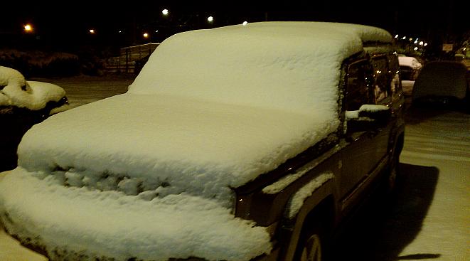 snow covereed jeep at Newark Northgate railway station last night