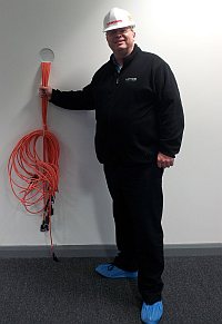 Tref holding some cables at the Timico Newark data centre